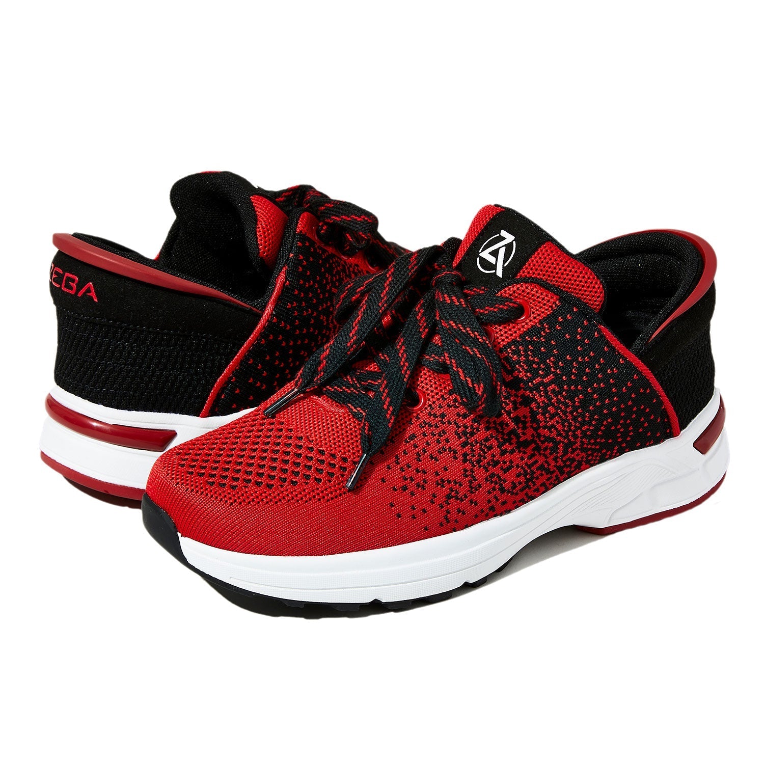 Red and black athletic shoes with white soles on a white background